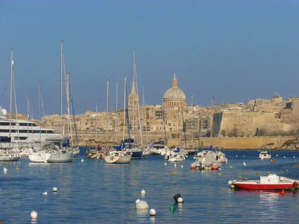 Basilica of Our Lady of Mount Carmel dome in Valletta Malta overlooking Grand Harbour skyline