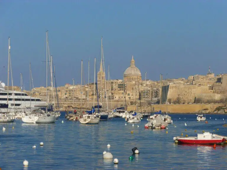 Basilica of Our Lady of Mount Carmel dome in Valletta Malta overlooking Grand Harbour skyline