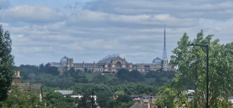 View of Alexandra Palace (Ally Pally) and the North London skyline on a cloudy day.